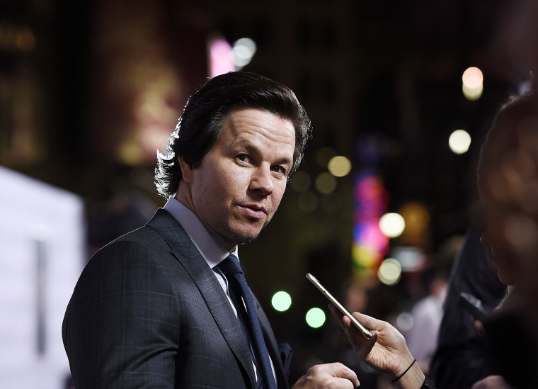 Image: Cast member Mark Wahlberg speaks to reporters during the premiere of \"The Gambler\" in Los Angeles