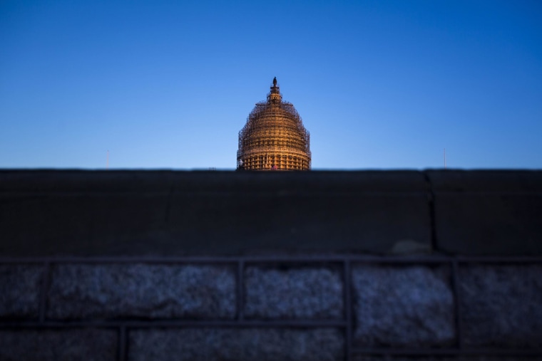Image: US Capitol Dome at Dusk Encased in Scaffolding