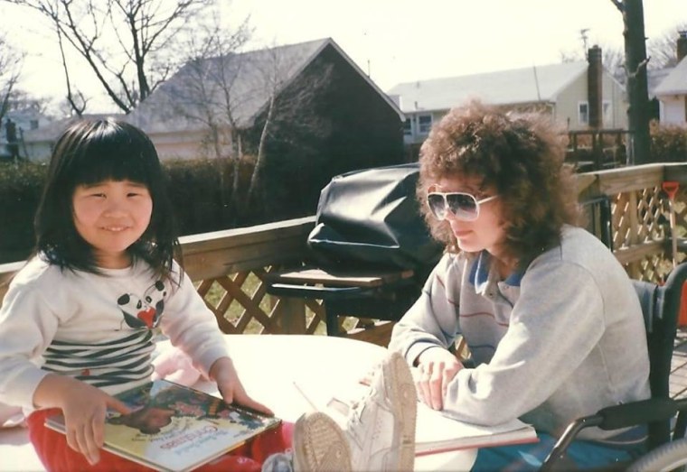 Reading my favorite childhood book, The Sweet Smell of Christmas with my mother in our backyard in Farmingdale, NY. 