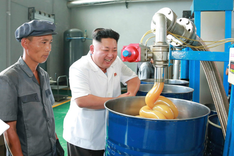 Image: KCNA picture shows North Korean leader Kim Jong Un smiling during a visit to the Chonji Lubricant Factory