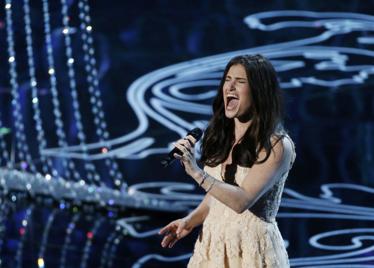 Image: Menzel performs nominated original song "Let it Go" by Lopez and Anderson-Lopez, for the film "Frozen" at the 86th Academy Awards in Hollywood