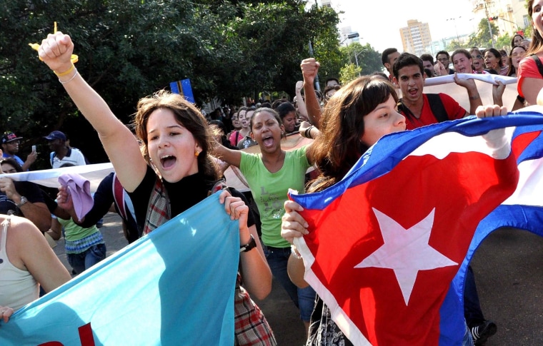 Image: Cuban students march in a street of Havana