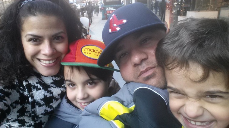 Image: Carmen Sanchez, 33, with (left to right) her son, Jacob, 10, her husband, Adonis, 39,  and son, Sean, 7