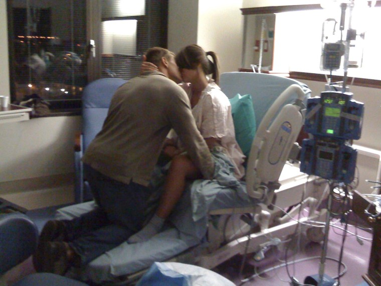 Wes, helps wife Nicole during the birth of their first son, Jaxton.