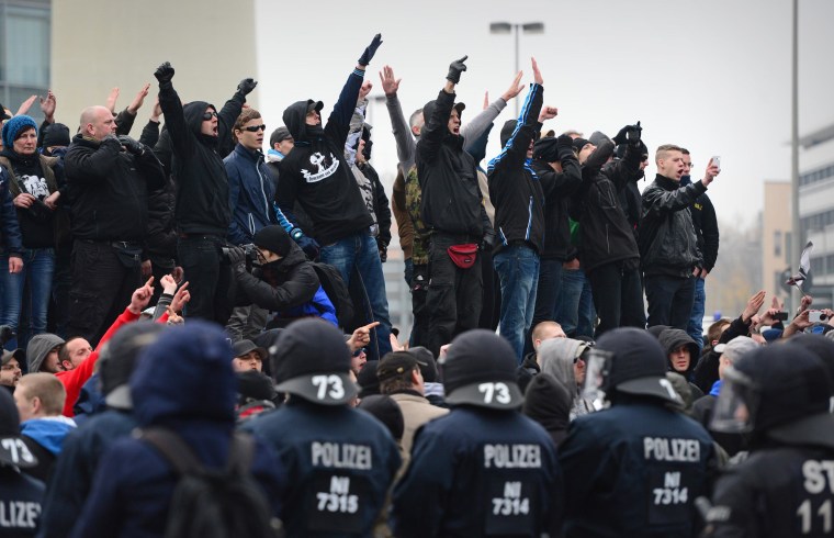 Image: A "Hooligans Against Salfists" rally in Hanover, Germany, on Nov. 15