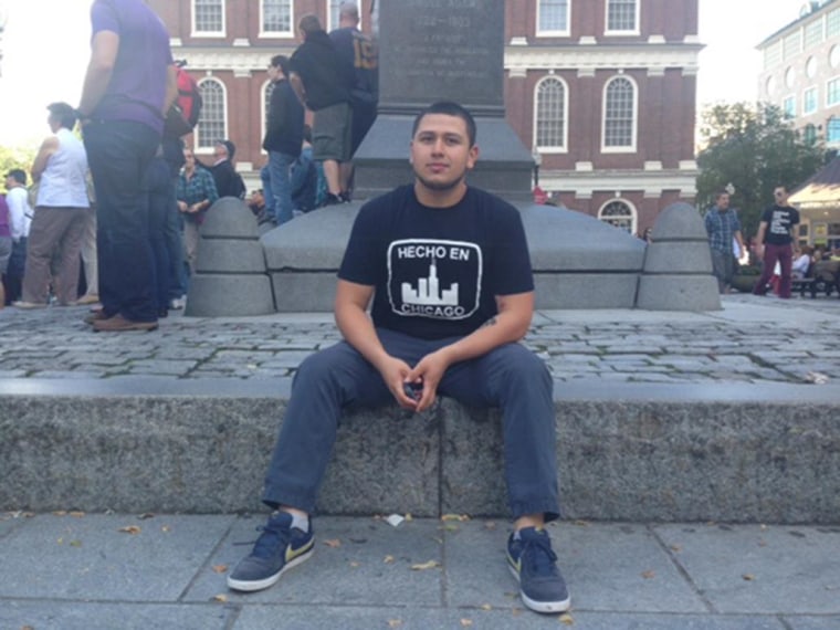 Image: Jaime Hermosillo sits in Quincy Market in Boston, Mass.