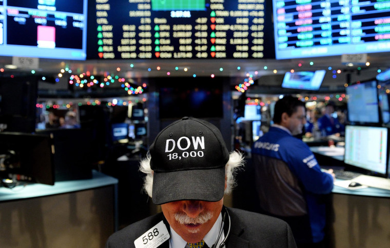 Image: Dow Jones average closes over 18,000 at New York Stock Exchange