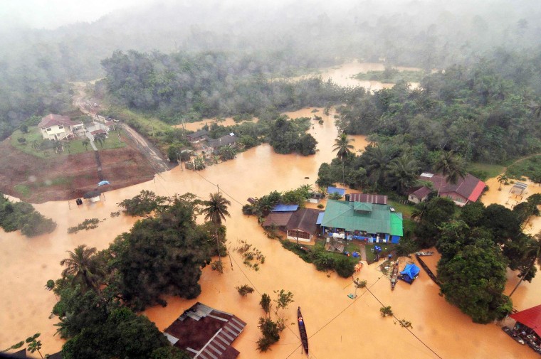 Image: An aerial view of flooded streets of the National Park in Kuala Tahan, Pahang