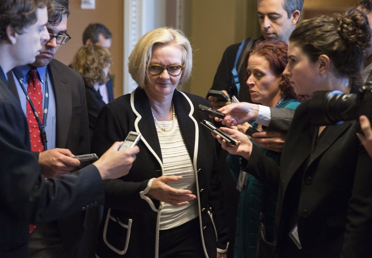 Image: Senator Claire McCaskill (D-MO) walks after leadership elections for the 114th Congress