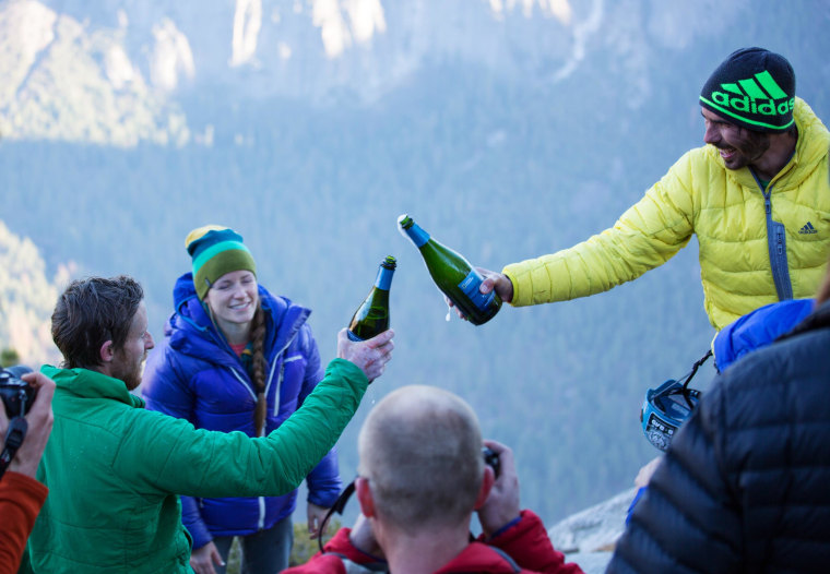 Image: Climbers Tommy Caldwell and Kevin Jorgeson celebrate on the summit of El Capitan