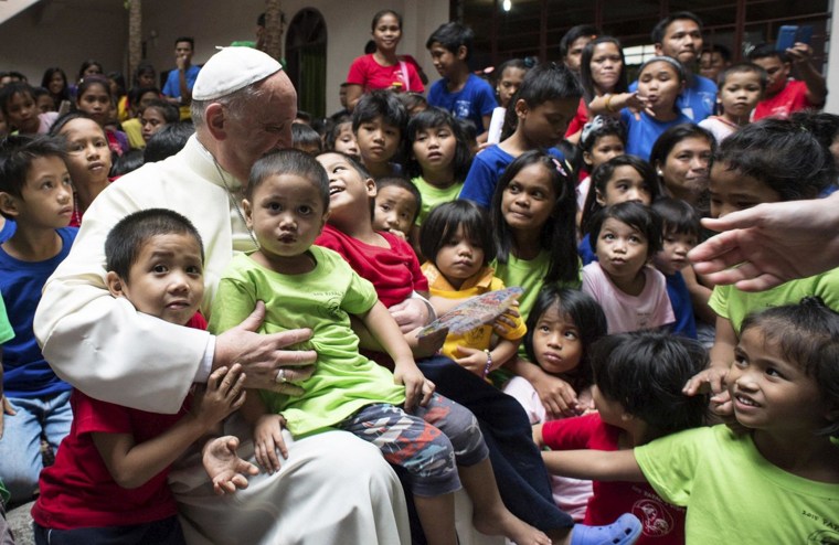 Image: Pope Francis is pictured with youths at ANAK-Tnk foundation during his pastoral visit in Manila
