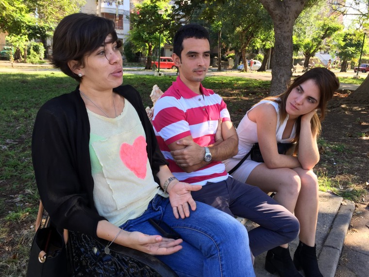 Paola Larramendi, Eloy Costa and Talia Bustamante from left to right Chat about the December 17 announcement at John Lennon park