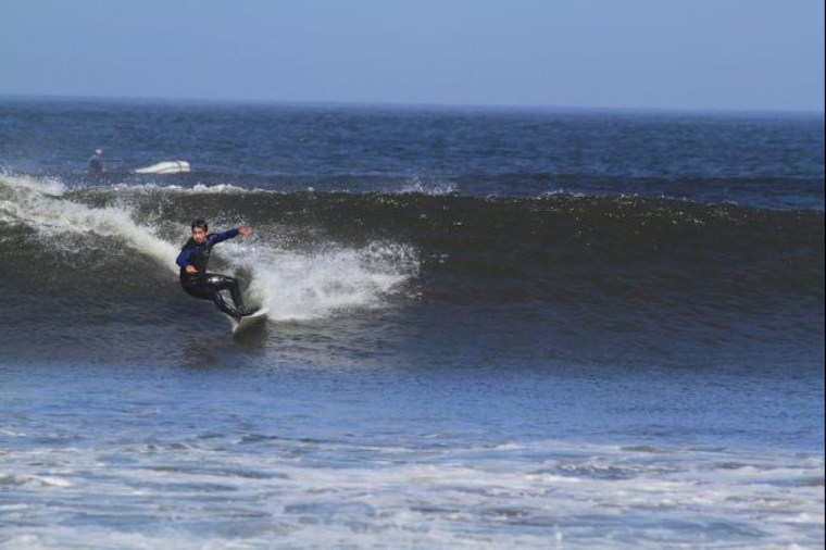 Gino "Chato" Guillen surfing Chicama, on Peru's northern Pacific coast, earlier this month. He caught about the first 10 percent of what's known as the world's longest wave. (Jesus Florian Castillo/Courtesy)