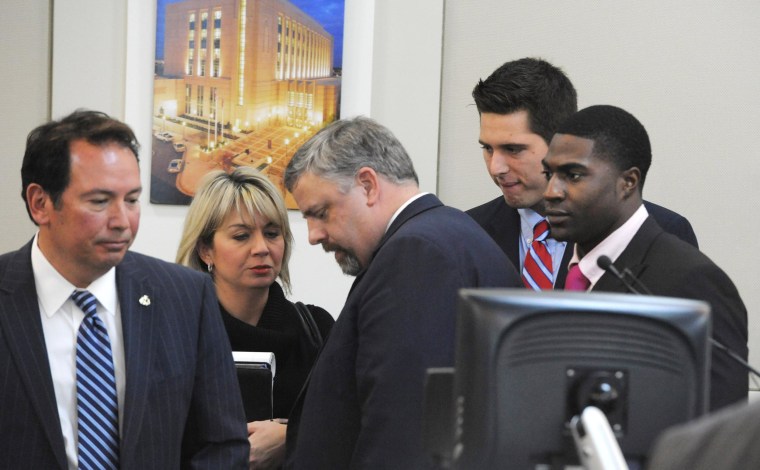 Image: The defense gatherers after the jury was read the charges against Brandon Vandenburg and Cory Batey