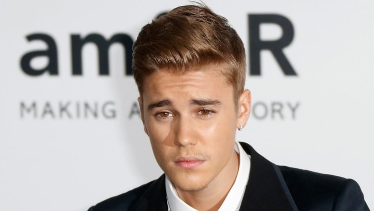 epa04219752 Canadian singer Justin Bieber attends the Cinema Against AIDS amfAR gala 2014 held at the Hotel du Cap, Eden Roc in Cap d'Antibes, France, 22 May 2014, during the 67th annual Cannes Film Festival. The festival runs from 14 to 25 May.  EPA/GUILLAUME HORCAJUELO