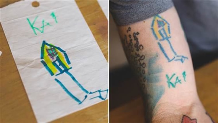 Keith Anderson's son's art decorates one arm in the form of tattooes.