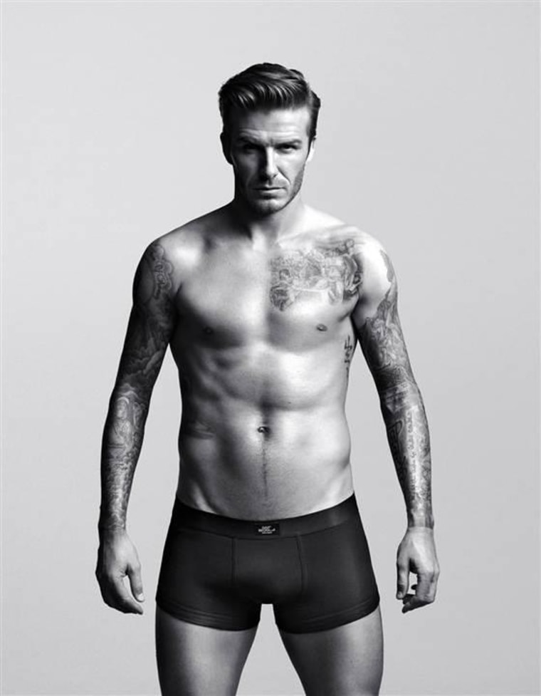 This undated photo provided by H&amp;M shows a look from the new collection created and modeled by David Beckham. Evolving trends in fashion are having an...