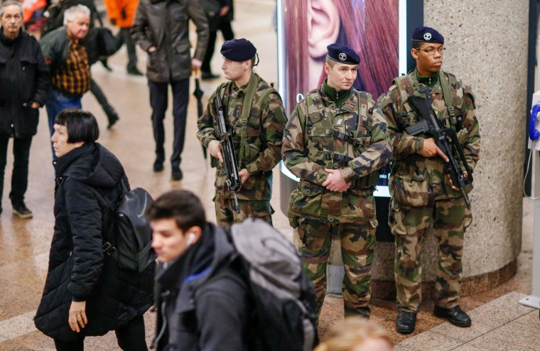 Image: French soldiers patrol the Part-Dieu railway station as part of the \"Vigipirate\" security plan