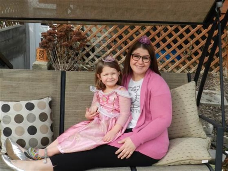 Terri and her daughter Kennedy, 4, who chose matching princess outfits for a Sunday dinner with friends.