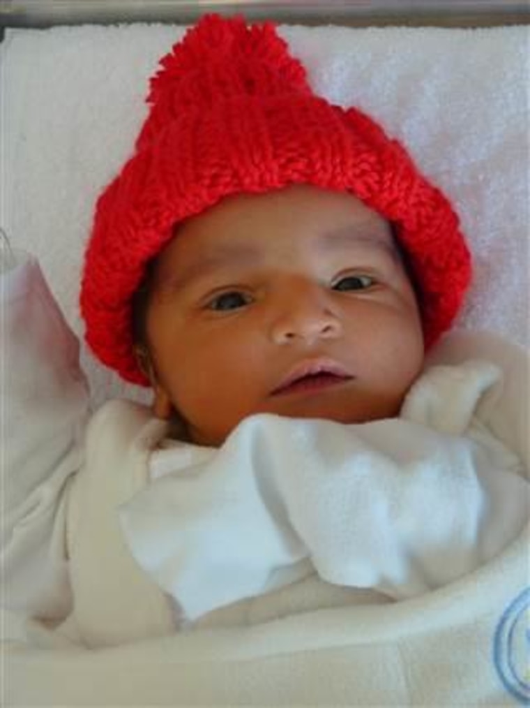 Ian Thomas in his red cap.