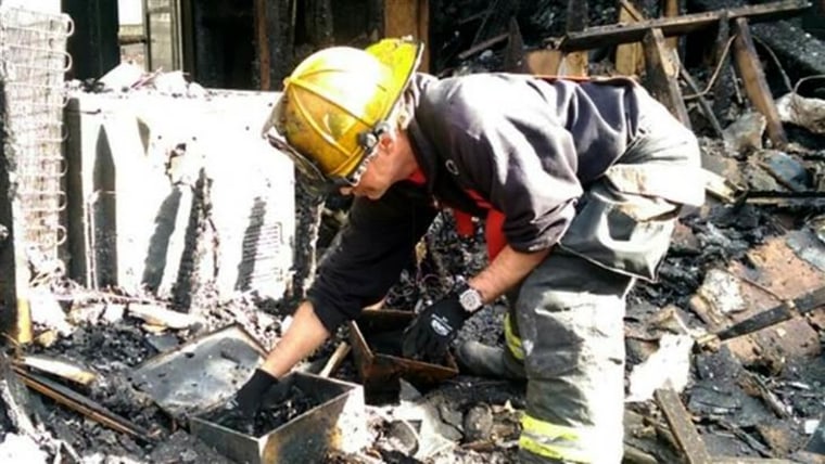 The only items salvaged from firefighter Mike Reim's house were a coffee container, a friend's photo album, a fire nozzle and a copy of The Book of Mormon.