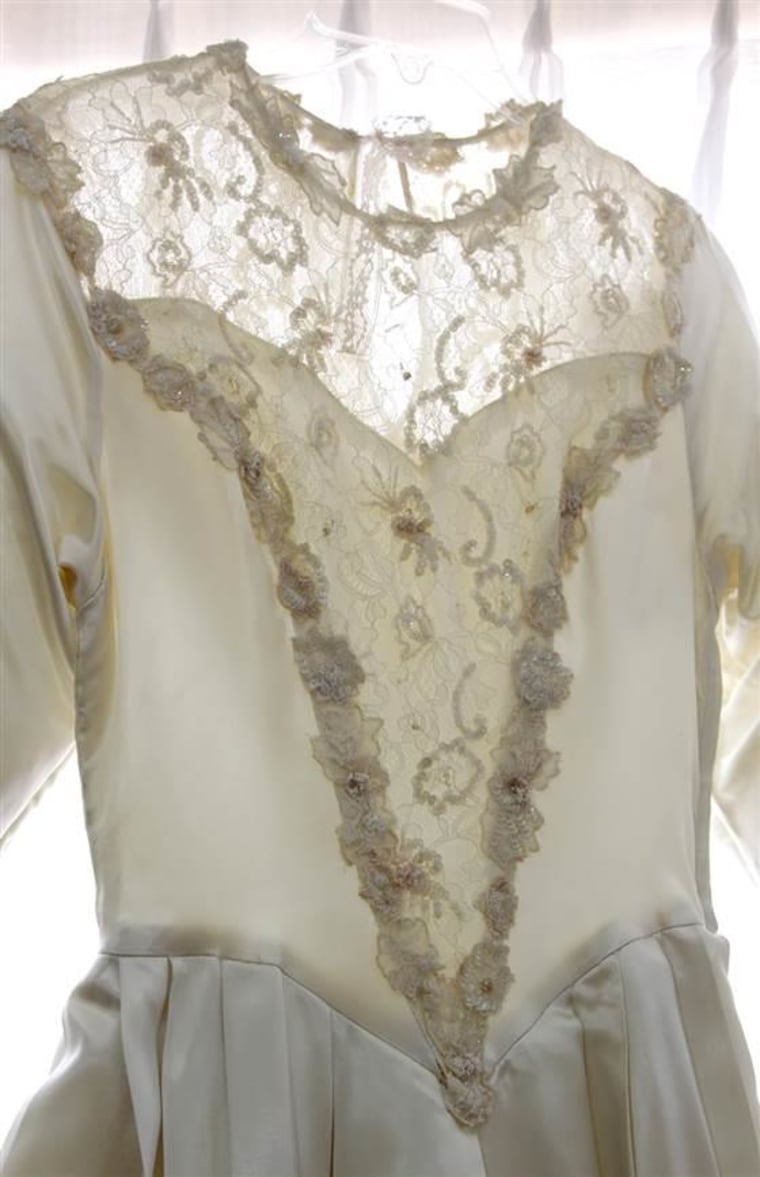 A detail of the shared gown, which a clipping of Helene's wedding announcement describes as a "bodice of lace, seed pearls and irridescent [sic.] sequins."