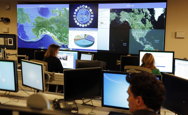 Image: Department of Homeland Security workers at the National Cybersecurity and Communications Integration Center in Arlington
