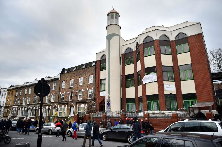 Image: People walk past Finsbury Park Mosque