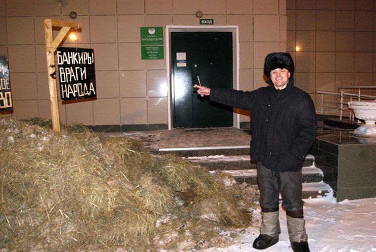 Irate farmer Alexander Bakshayev paid his loan to the bank by dumping a cartload of manure in front of its office. The manure costs exactly what he owes.