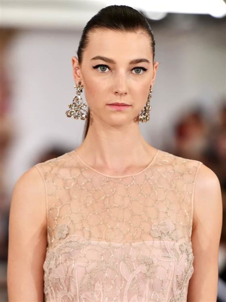 A model walks the runway at the Oscar De La Renta fashion show during Mercedes-Benz Fashion Week Spring 2015 on September 9, 2014.