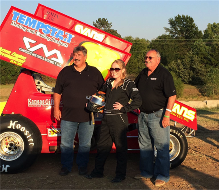 Race track owners Jeff Whitehead and Bill Johnson with Justine Komin at 81 Speedway in Park City, Kansas.