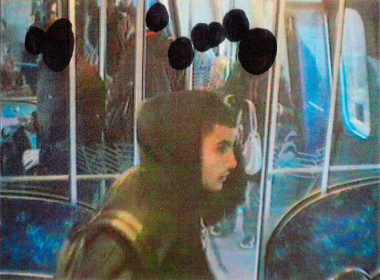 Image: An image released by Danish police shows Omar Abdelhamid Hussein on a subway train in 2013