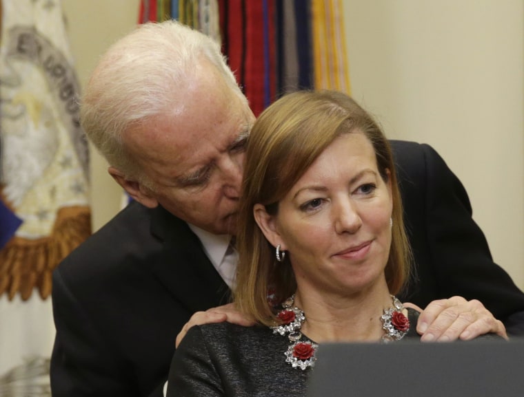 Image: United States Vice President Biden talks to Stephanie Carter, wife of new US Secretary of Defense in Washington