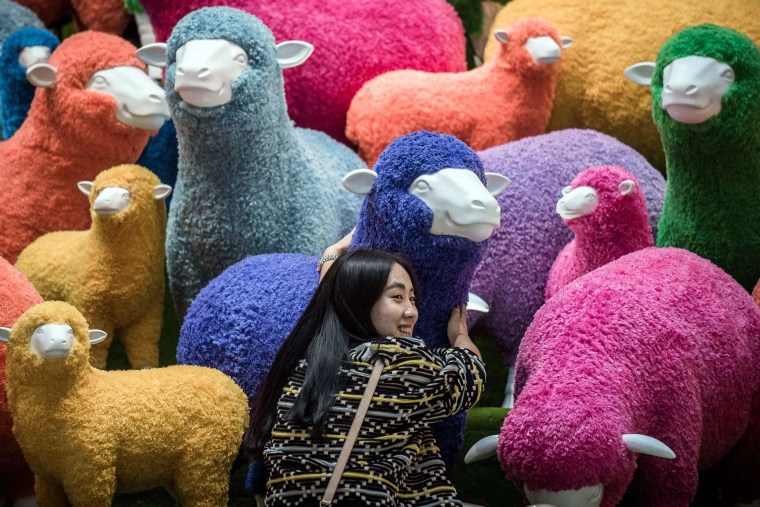 Image: A sheep installation displayed in a Hong Kong shopping mall for the Chinese New Year celebrations