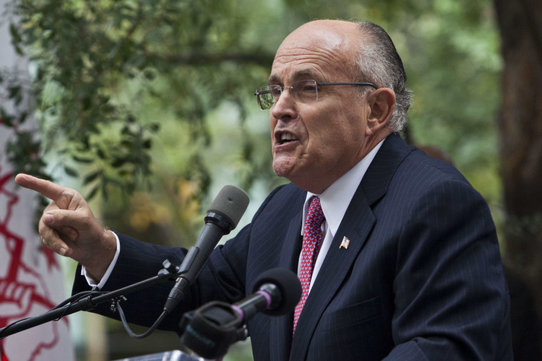 Image: Former New York mayor Giuliani speaks at protest organized against presence of Iranian president Ahmadinejad at U.N. General Assembly in New York