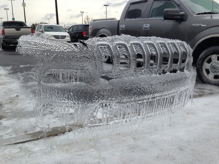 Image: Ice imprint of the front of a Jeep