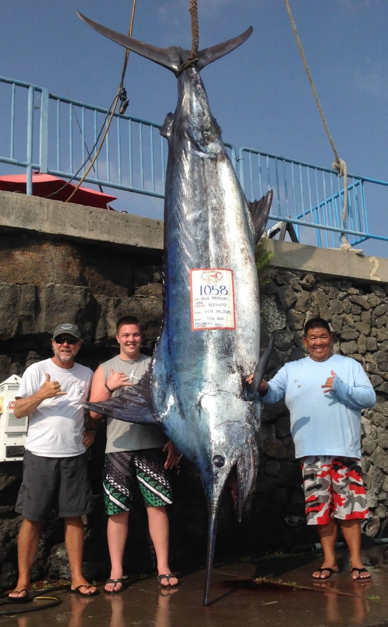 Image: Kai Rizzuto, 16, lands a 1,058-pound blue marlin off Kona, Hawaii.