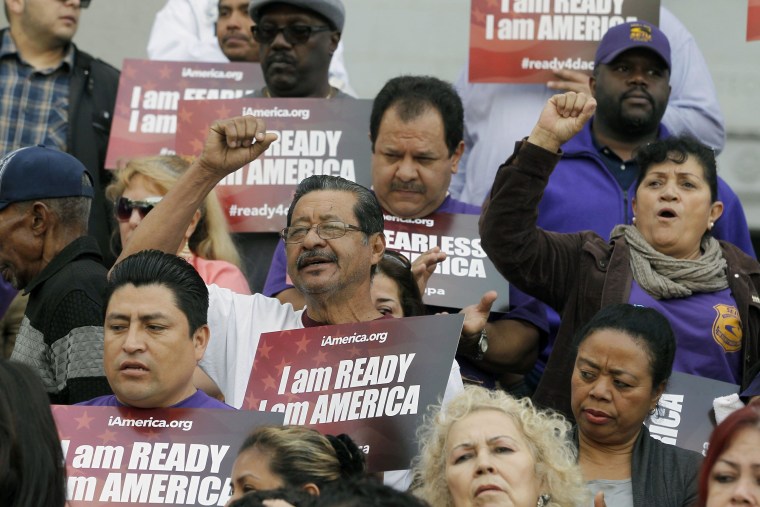 Community activists rally for DACA.