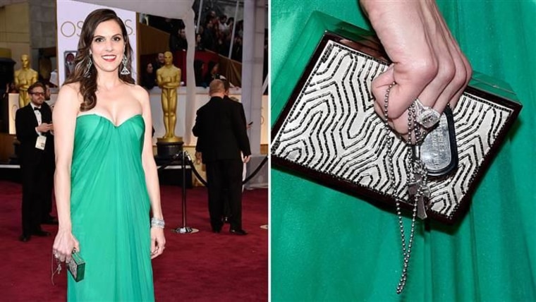 Taya Kyle, widow of Navy SEAL Chris Kyle, carried military dog tags with her on the red carpet.