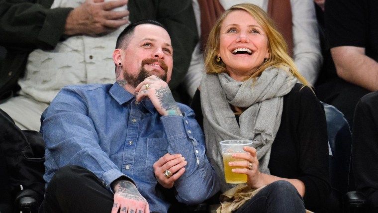 Benji Madden and Cameron Diaz attend a basketball game between the Washington Wizards and the Los Angeles Lakers