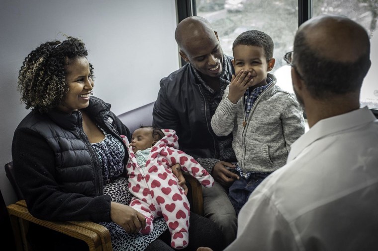 Image: Dr. Michael Darden's uncommon bedside manner was on display in a viral video when he gave toddler, Noah Raey (cq) his vaccinations.