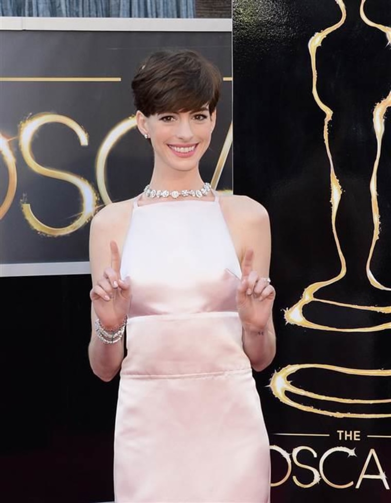 Anne Hathaway arrives at the Oscars on Feb. 24, 2013.