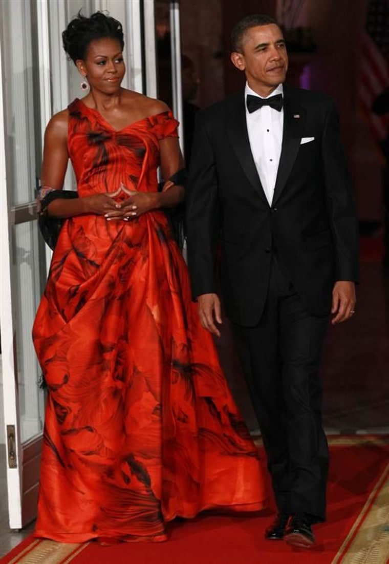President Barack Obama and first lady Michelle Obama greet Chinese President Hu Jintao prior to a State dinner at the White House Jan. 19, 2011.