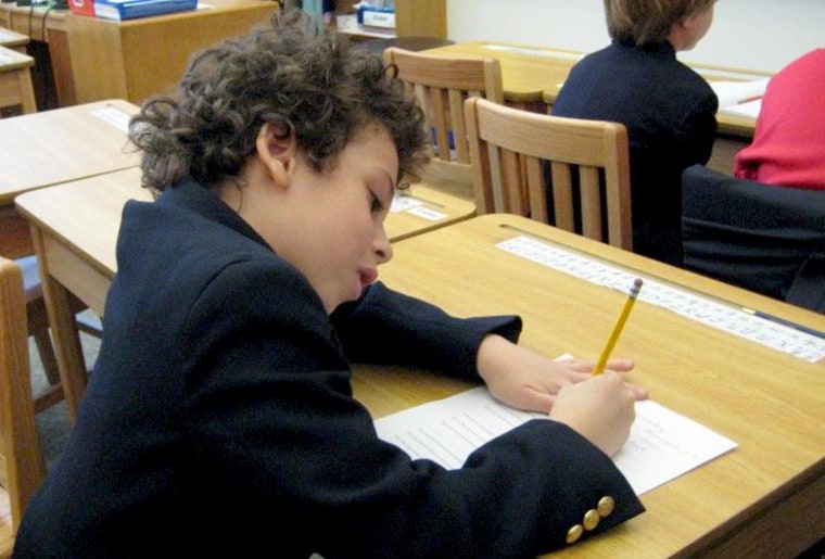The author’s son, Adam (shown at age 10) has taken his share of standardized tests.