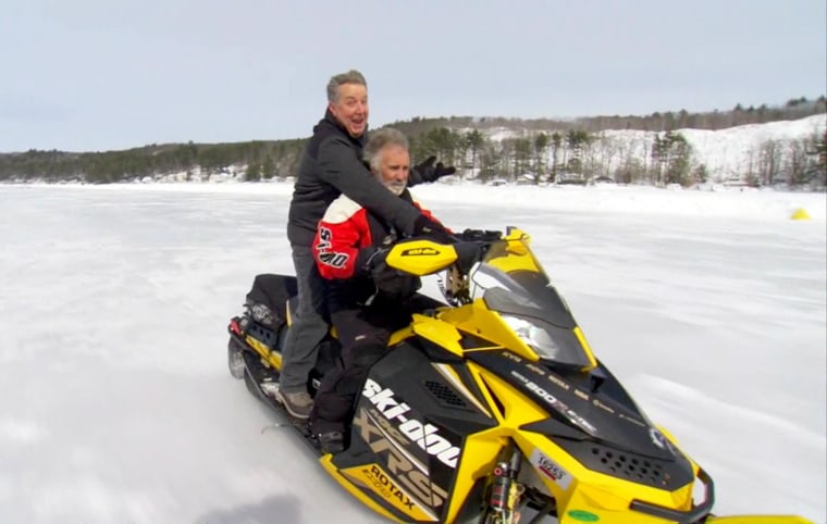 TODAY's Kerry Sanders hitches a ride down the 3,000-foot ice runway on a snowmobile.
