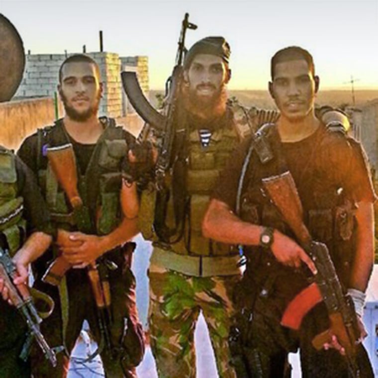 From left, Mohammed el-Araj, Yilmas a former soldier from Holland, and Choukri Ellekhlifi pose in Syria. El-Araj and Ellekhlifi were London associates of Jihadi John.