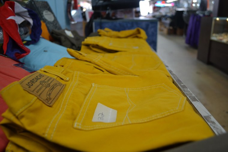 Image: Mustard yellow uniform pants