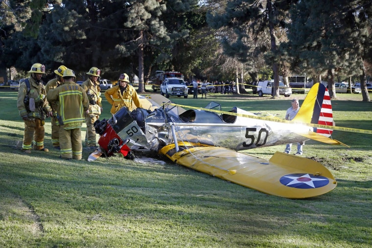 Image: An airplane sits on the ground after crash landing at Penmar Golf Course in Venice, Los Angeles CA