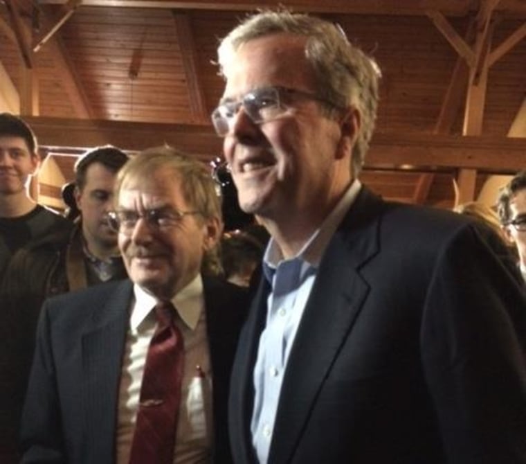 Jeb Bush taking picture with attendee at a fundraiser for Rep. David Young, R-Iowa, in Urbandale, Iowa on March 6, 2015