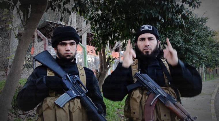 A member of ISIS uses sign language in a recruitment video for the group.